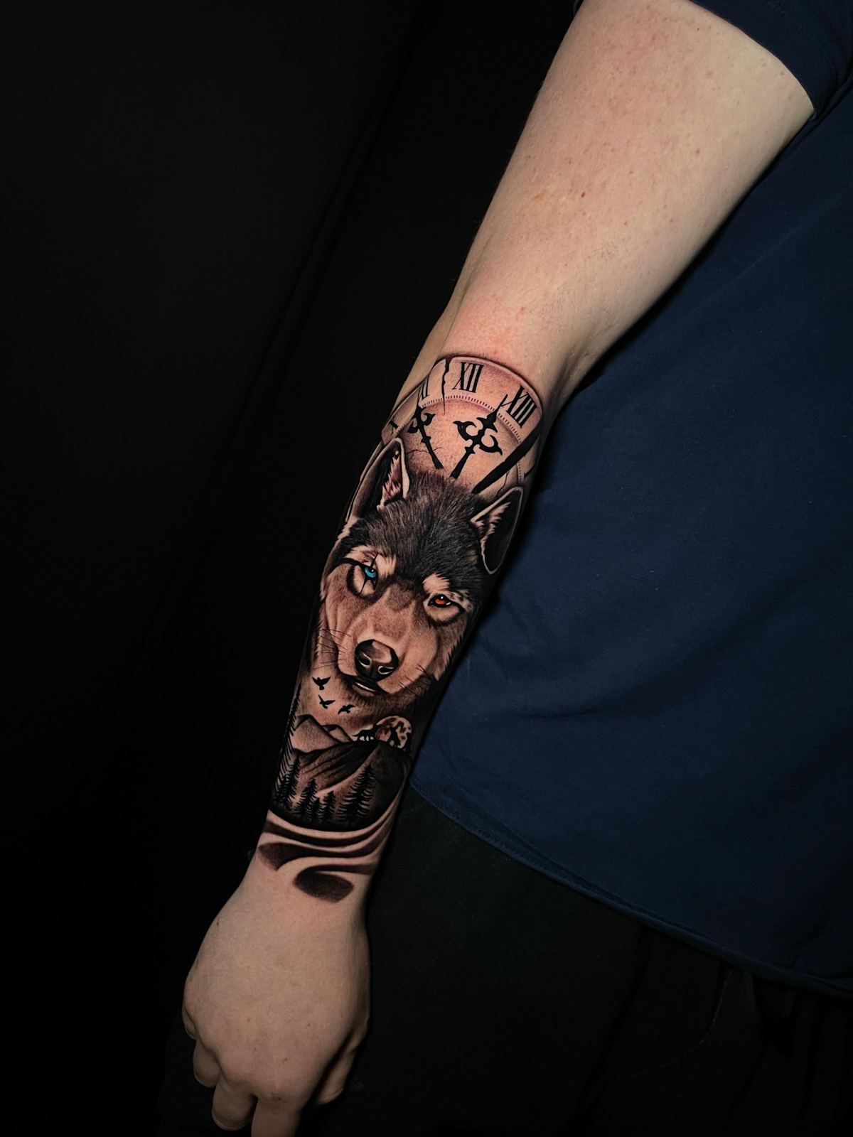 Realistic wolf and clock tattoo in black and grey